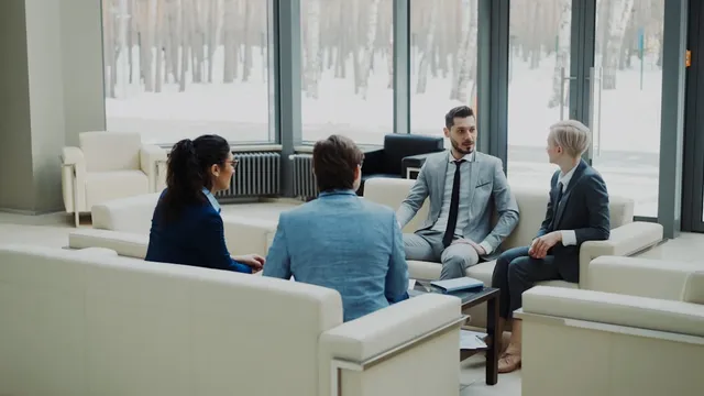 image_suggestion: business team meeting discussing finance