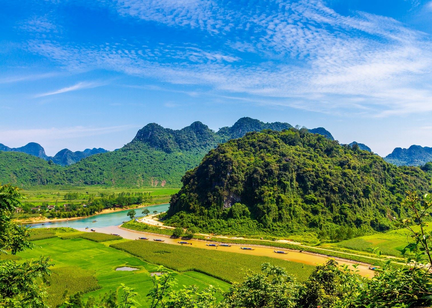Aerial view of Phong Nha-Ke Bang National Park with karst mountains and lush jungle canopy
