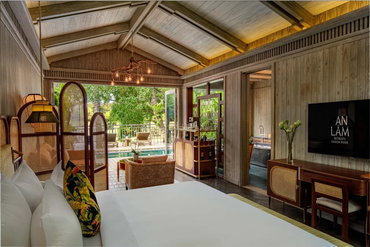 Phòng ngủ cho một kỳ nghỉ chữa lành tại An Lâm Retreats Saigon River
