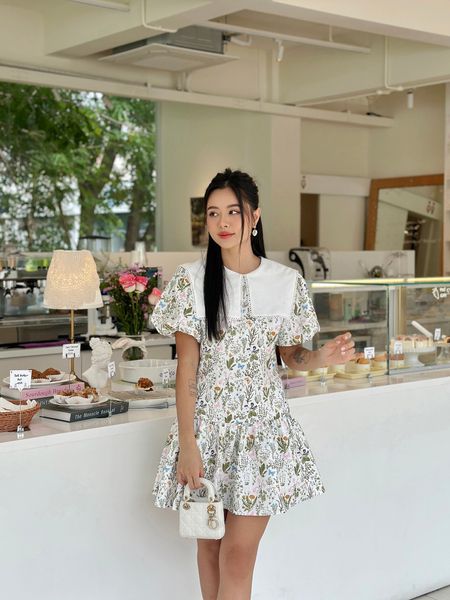 Đầm xòe nhấn eo tạo đường nét nữ tính mà vẫn kín đáo