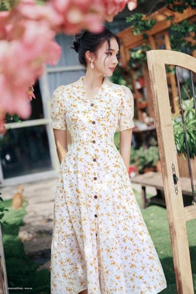 Đầm hoa nhí nền kem tươi mới