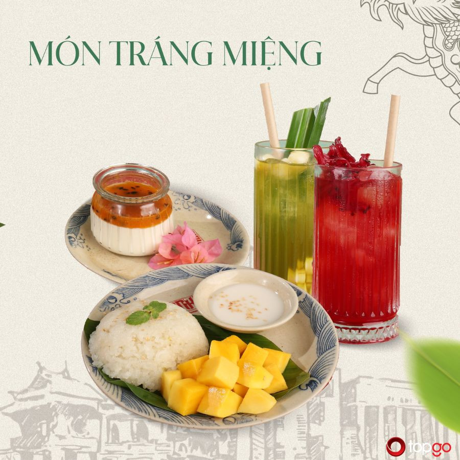 Món tráng miệng thanh mát với hoa quả tươi và bánh ngọt tại Dinh Restaurant Landmark 72, hoàn hảo cho bữa ăn