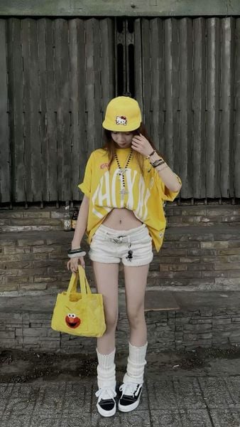 Áo thun form rộng nữ thắt nút hoặc sơ vin nửa vạt