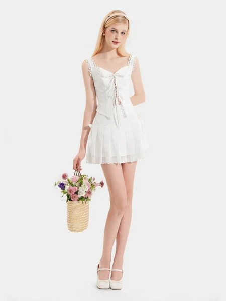 Váy mini lưng liền xếp li phối ren lai đính nơ hông