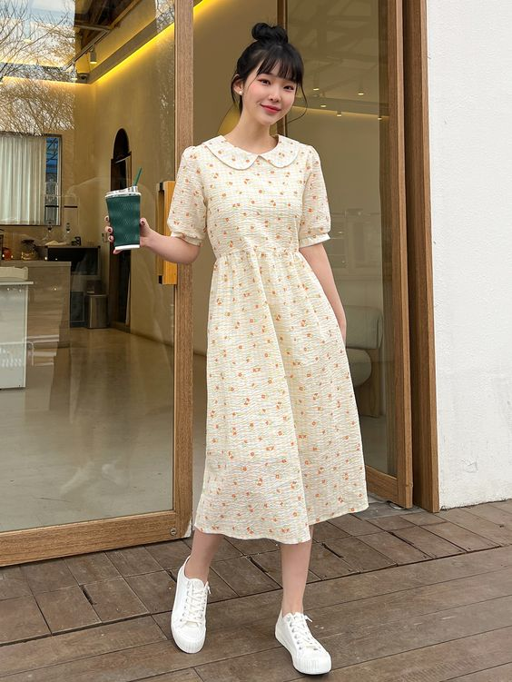 Outfit nhẹ nhàng cho cô nàng nữ tính là phối đầm hoa với giày búp bê