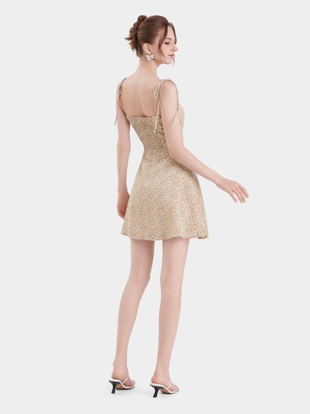 Đầm mini họa tiết thắt nơ vai smocking lưng
