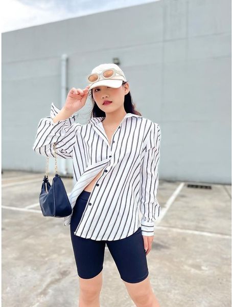 Áo sơ mi caro nữ phối cùng thiết kế gọn dáng giúp tôn tỷ lệ cơ thể tốt hơn