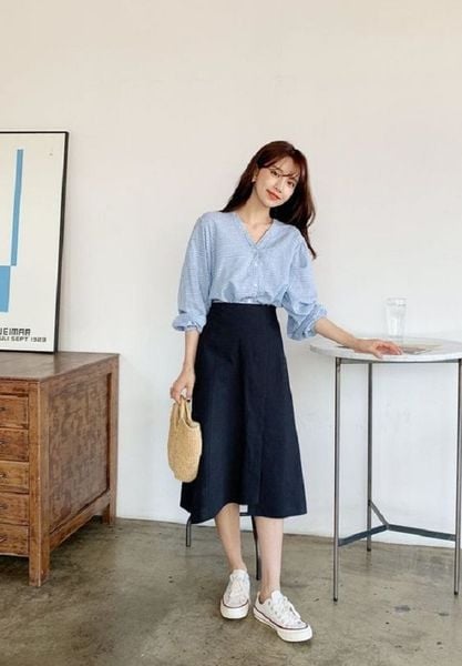 Chân váy đen giúp dáng gọn