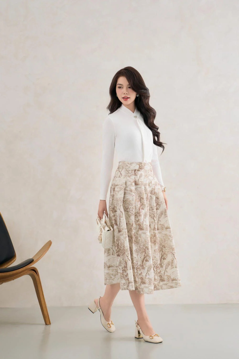 Áo len cao cổ + chân váy xòe dài + boot cao cổ