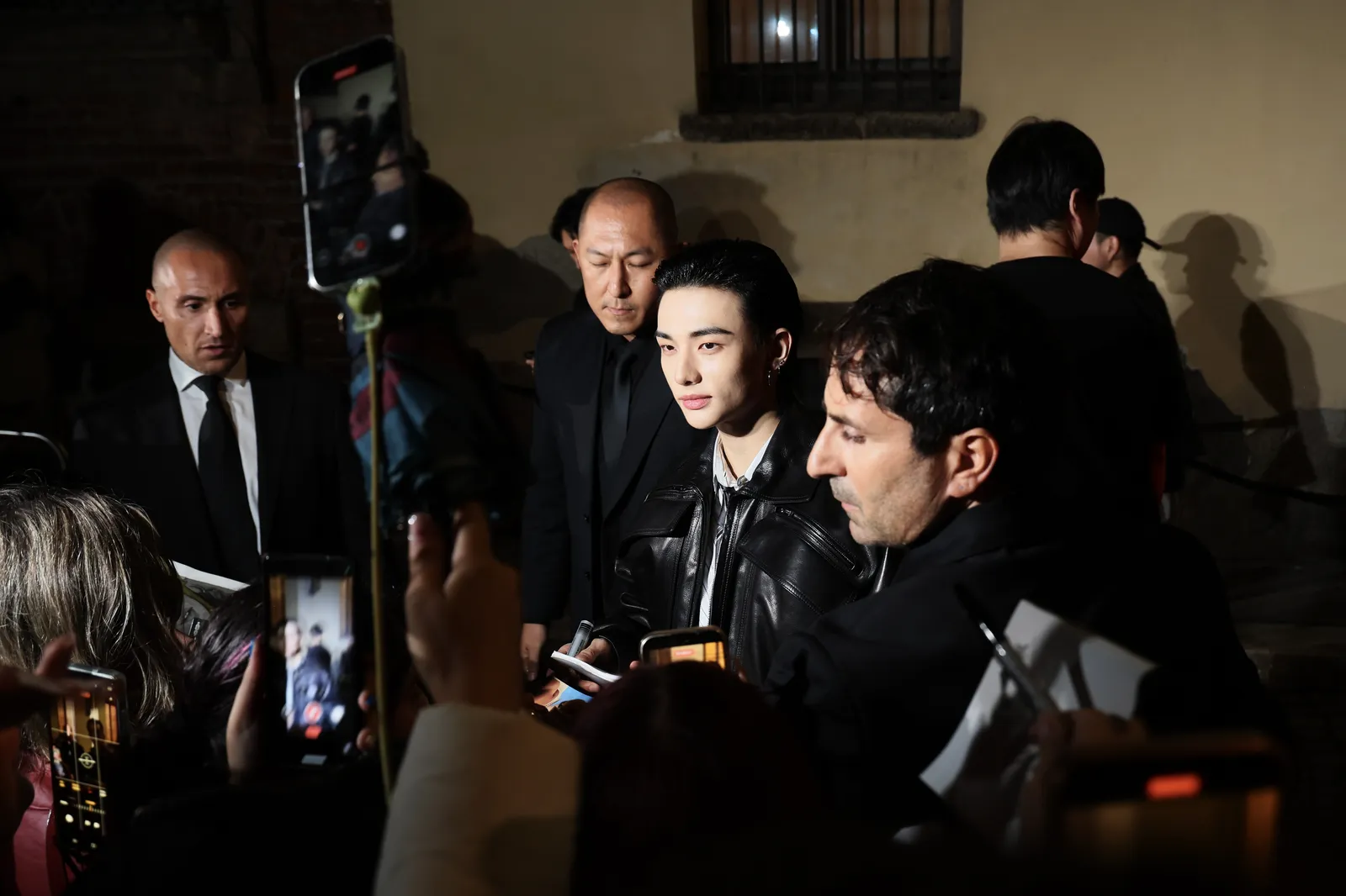 Hyunjin arrives at Versace presentation during the Milan Womenswear SpringSummer 2026 on September 26 2025 in Milan Italy.