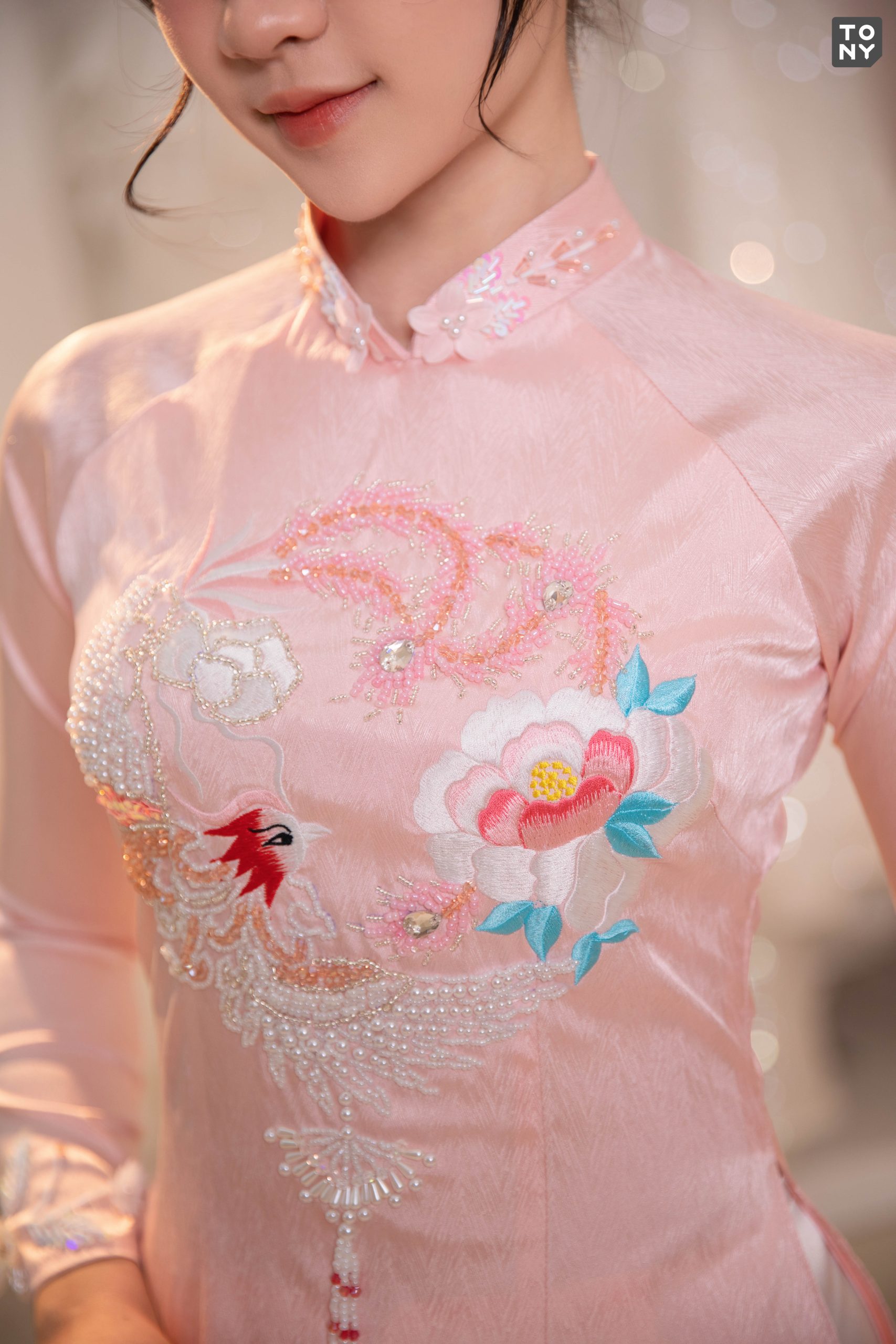 Áo dài cưới hồng thêu phượng