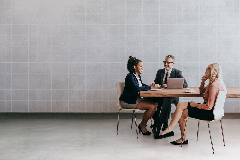 professionals discussing in meeting room
