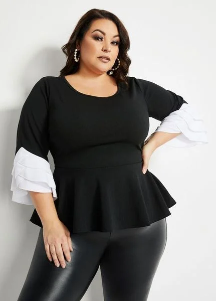 Áo peplum tạo điểm nhấn thắt eo giả giúp tái cấu trúc vóc dáng