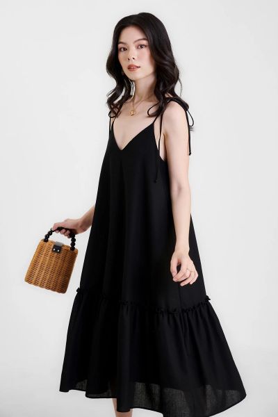 Đầm linen midi 2 dây xẻ V với đường nét tinh gọn và nữ tính