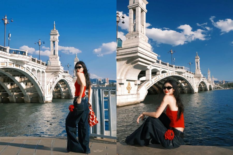 Đứng quay lưng, đầu xoay nhẹ về phía camera
