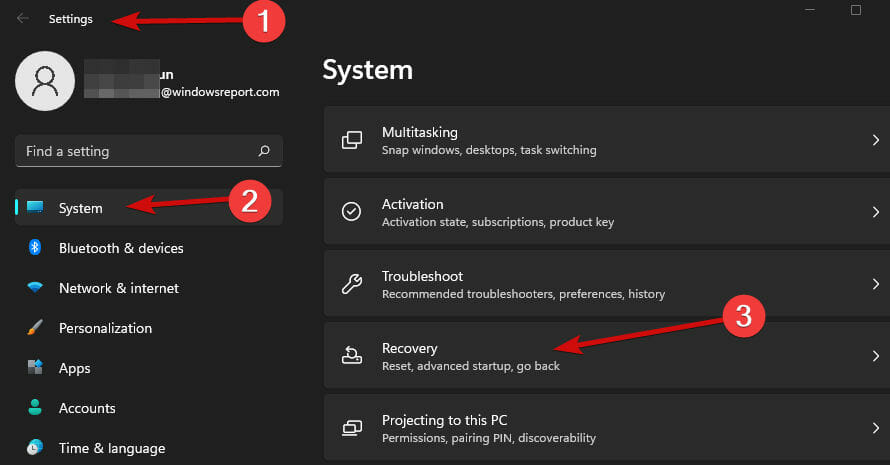 Vào Settings > nhấn vào mục System > Chọn Recovery
