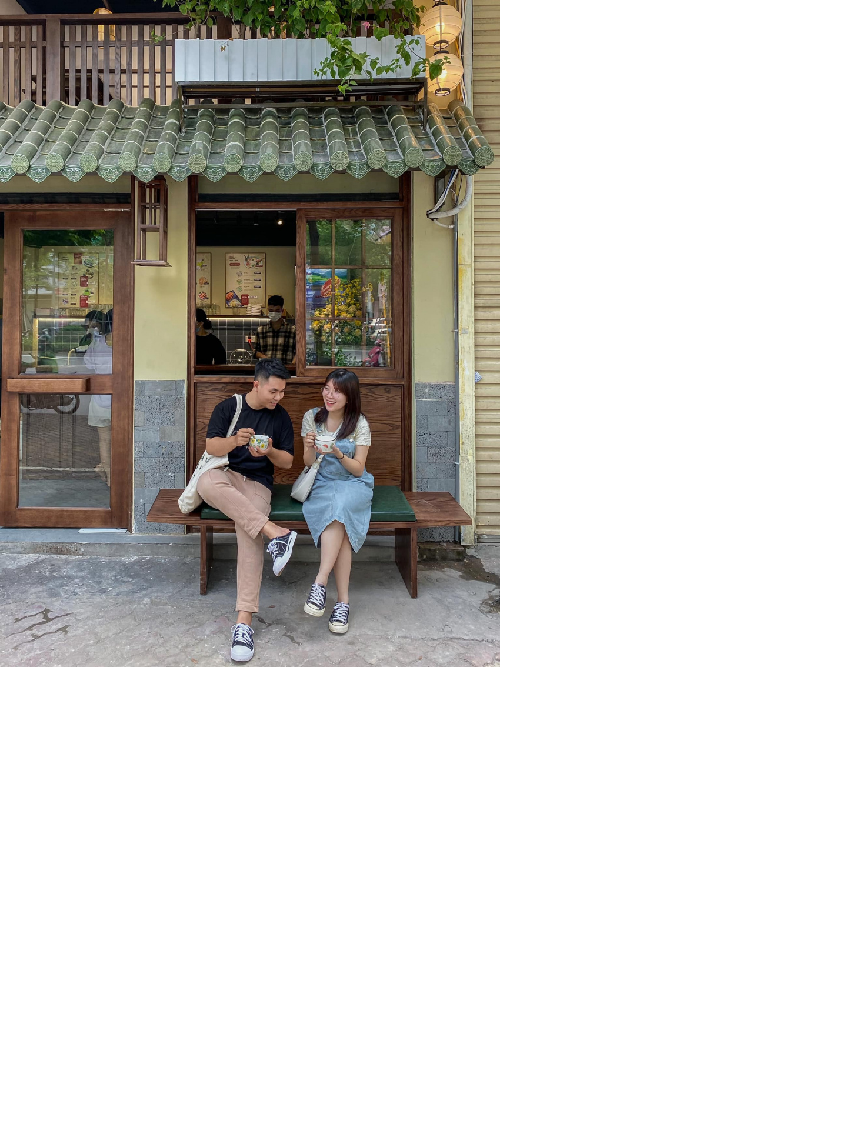 Tạo dáng ngồi chụp ảnh ở quán cà phê