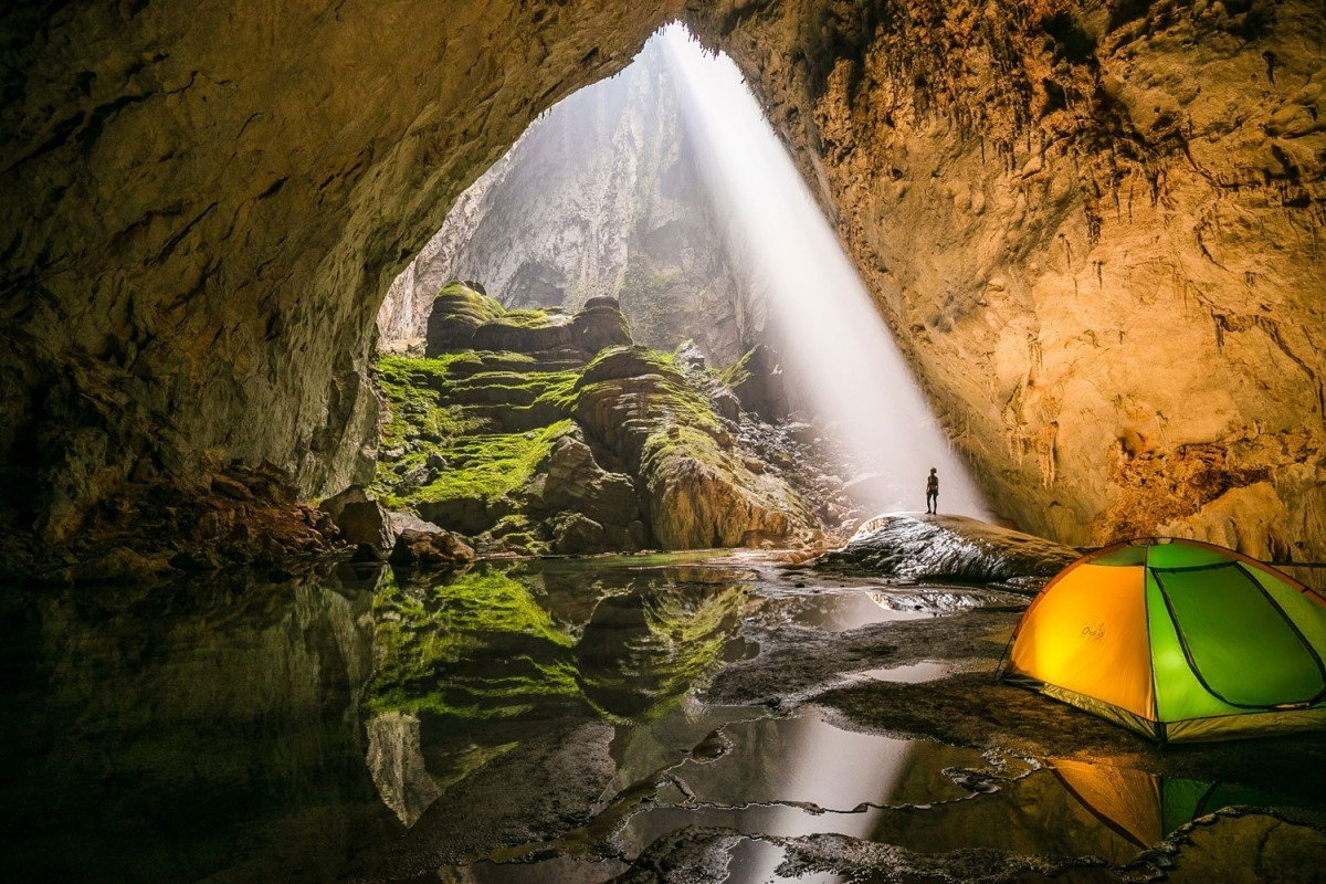 Son Doong cave interior with massive stalactites illuminated by natural light shaft