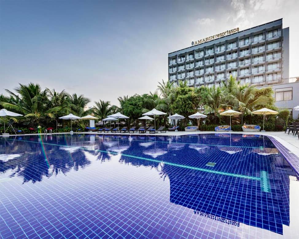 Aerial view of Phu Quoc's Bai Truong coastline with resort villas along the beach