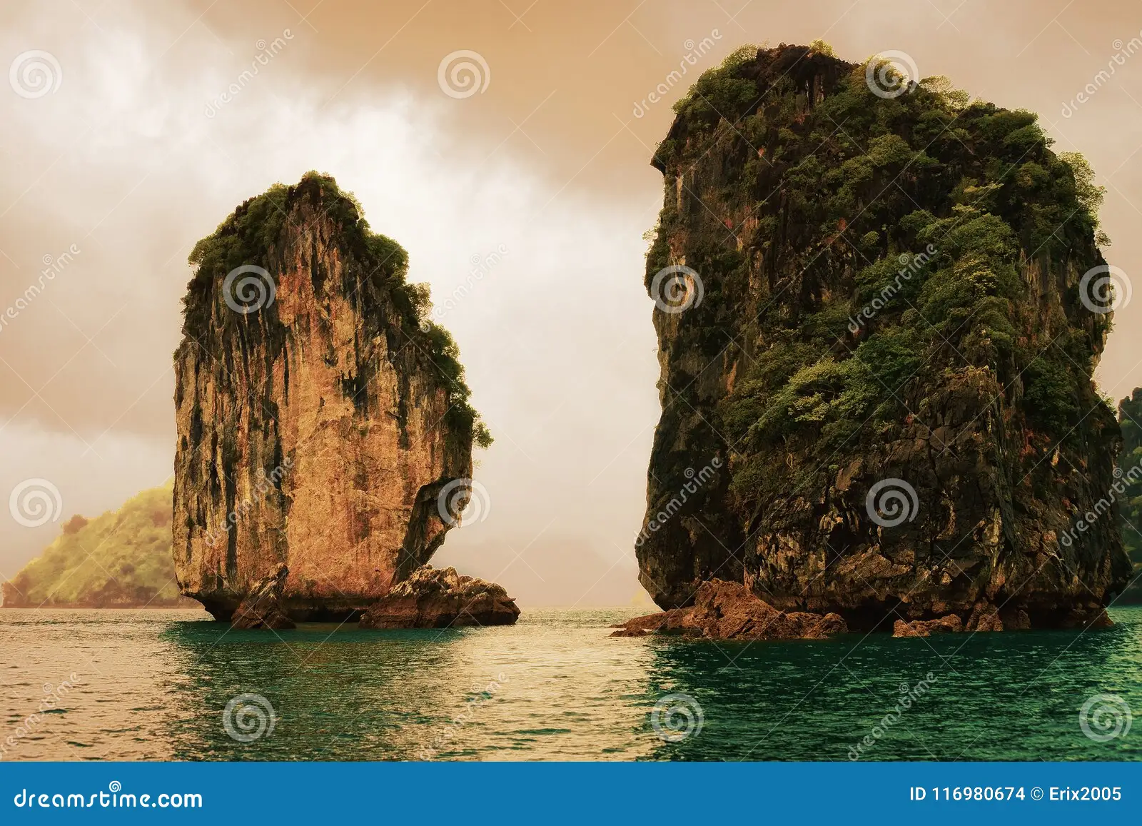 Rock climbing on limestone cliffs above Ha Long Bay deep water soloing