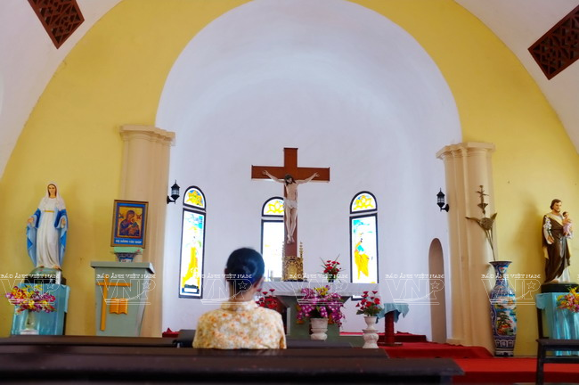 Tam Dao town surrounded by clouds and mist with ancient stone church